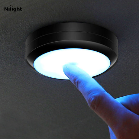 Light shields for attachment to vehicle interior dome lights that narrow the path of light to passenger compartment for reading purposes