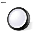 Light shields for attachment to vehicle interior dome lights that narrow the path of light to passenger compartment for reading purposes