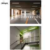Lighting fixtures for use in parking decks and garages