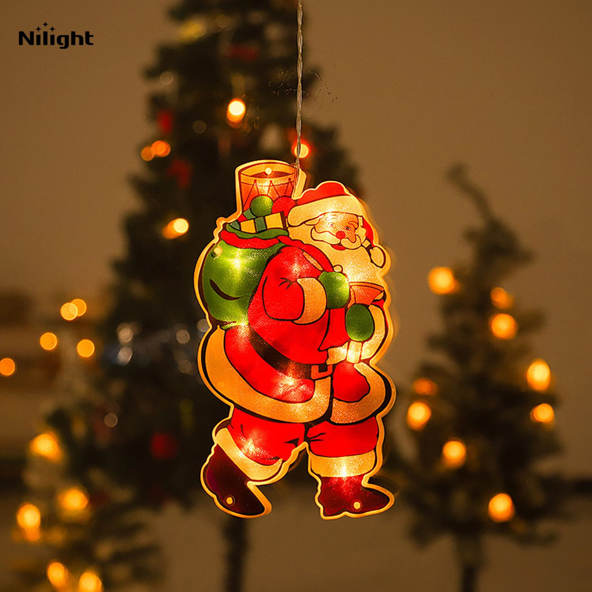 Outdoor lighted Christmas-themed ornaments