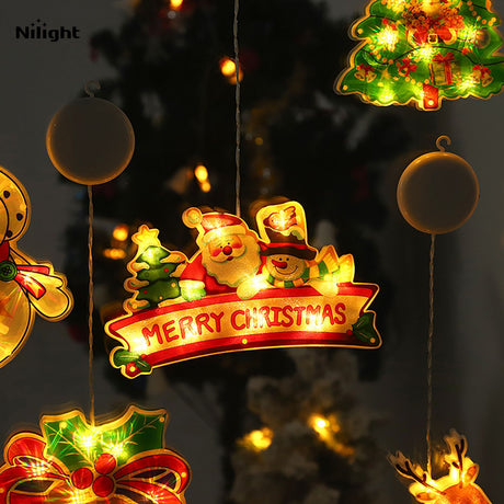 Outdoor lighted Christmas-themed ornaments